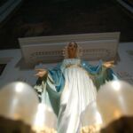 A statue of Our Blessed Mother watches over things at Our Lady of the Angels, where delegates met Thursday afternoon for workshops.