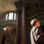 Father Kaz Chwalek, MIC, one of the organizers of the congress, prays the Chaplet of The Divine Mercy on Thursday at Our Lady of the Angels.
