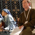 Religious from Rome sing during a special "Remembrance of Christ's Passion" prayer service at Our Lady of the Angels.