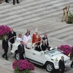 Following the opening Mass, Pope Benedict XVI greets the crowd.